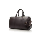 VUOTÍGA brown 100% leather duffel bag on a white background